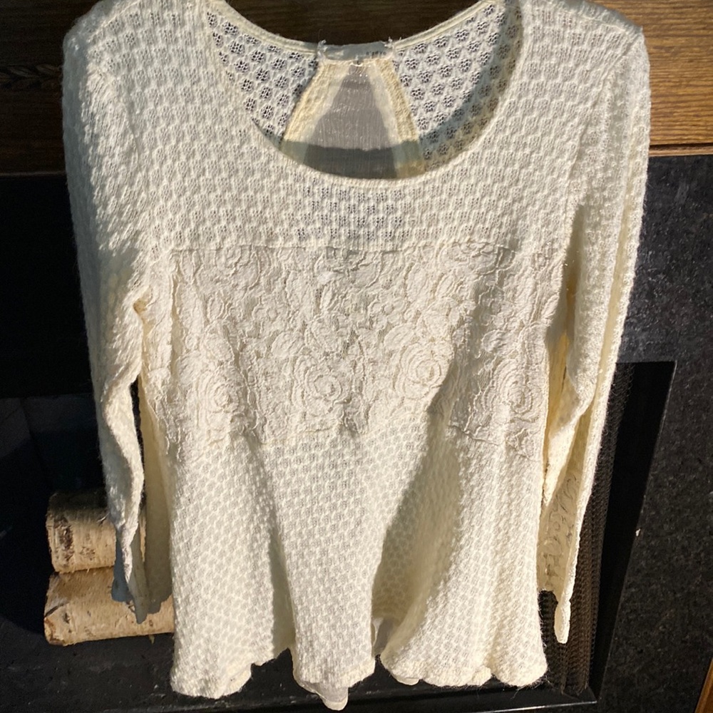 Very pretty. Swing top. Perfect with leggings.